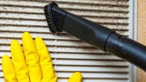 Cleaning window fan grill